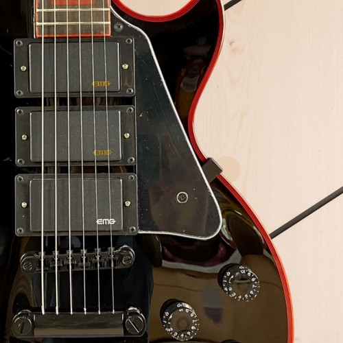 Black electric guitar - black,